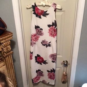 Fitted, high neck, below the knee dress